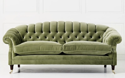 Green velvet Chesterfield couch